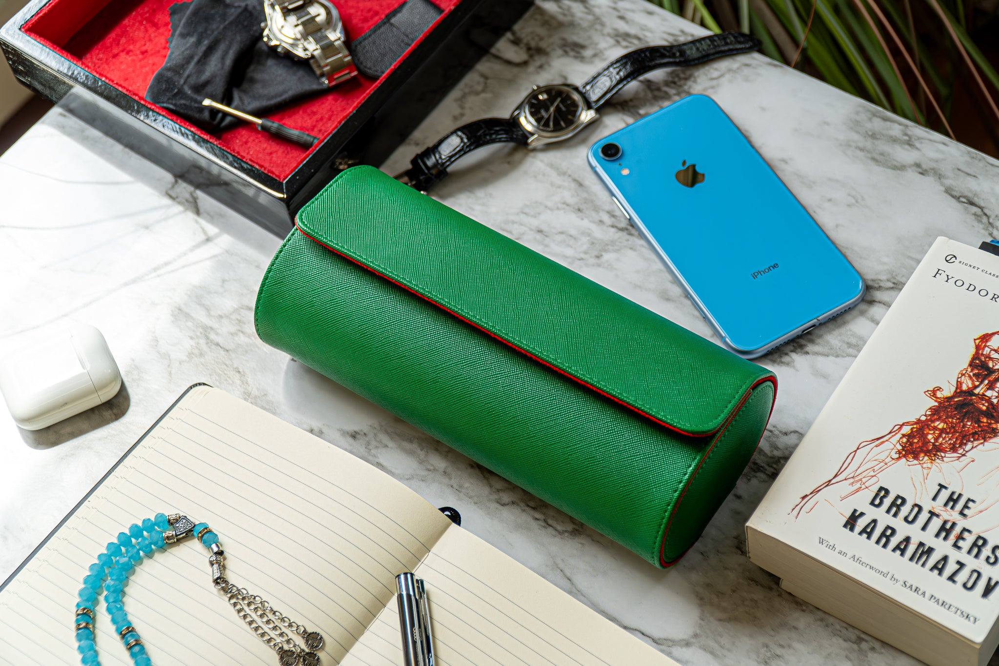 Elevate your watch storage game with this exquisite personalized green/red leather watch roll and watch case, accented with stylish green stitching. Crafted for travel, it's a portable watch organizer perfect for dad, mom, boyfriend, girlfriend, or any watch enthusiast in your life. Personalize it for a thoughtful gift on birthdays, anniversaries, Father's Day gift, Mother's Day gift, Christmas gift, or any special occasion. With space for three watches, keep timepieces safe and secure on the move