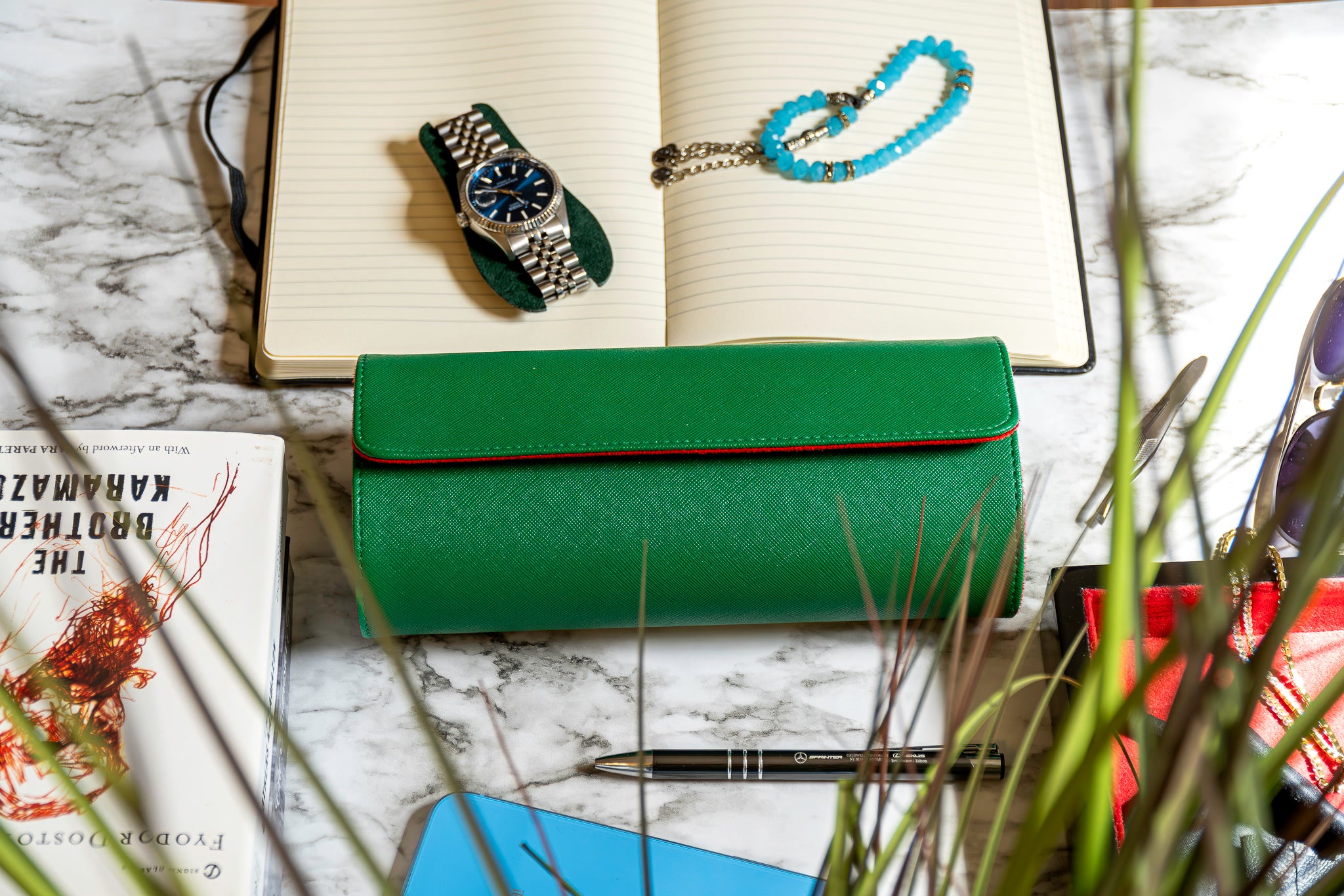 Elevate your watch storage game with this exquisite personalized green/red leather watch roll and watch case, accented with stylish green stitching. Crafted for travel, it's a portable watch organizer perfect for dad, mom, boyfriend, girlfriend, or any watch enthusiast in your life. Personalize it for a thoughtful gift on birthdays, anniversaries, Father's Day gift, Mother's Day gift, Christmas gift, or any special occasion. With space for three watches, keep timepieces safe and secure on the move