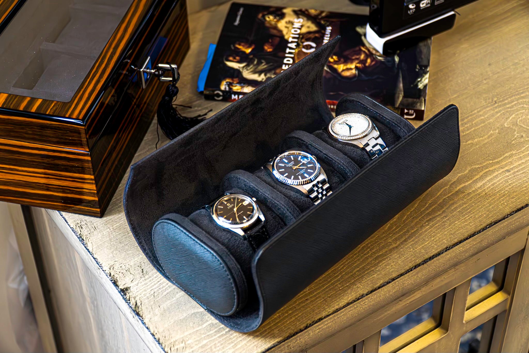 Elevate your watch storage game with this exquisite personalized black leather watch roll and watch case, accented with stylish black stitching. Crafted for travel, it's a portable watch organizer perfect for dad, mom, boyfriend, girlfriend, or any watch enthusiast in your life. Personalize it for a thoughtful gift on birthdays, anniversaries, Father's Day gift, Mother's Day gift, Christmas gift, or any special occasion. With space for three watches, keep timepieces safe and secure on the move